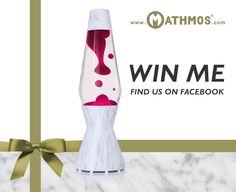 a white vase sitting on top of a marble counter next to a green ribbon with the words, win me find us on facebook