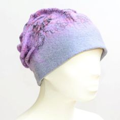 Felted Wool Hat, Winter Hat, Warm Hat, Wool Hat, Lavender and Grey Hat, Winter Accessories, Gift for Her, Christmas GiftVery light and warm felted hat made of merino wool and natural decorative fibers. It is 100% handmade. The hat is very pleasant to touch.It perfectly suits to this wool scarve:https://www.etsy.com/ch-en/listing/471831992/felted-wool-scarf-lavender-neckpiece?refThis hat can be a wonderful gift for the one you love.Composition: Merino wool, silk and bamboo fibersSize:  M / 56-57 Purple Cap As A Gift, Purple One Size Fits Most Bonnet, Handmade Purple Winter Hat, Purple Whimsical Winter Hat, Whimsical Purple Winter Hat, Purple Beanie Hat, One Size, Handmade Purple Beanie Hat, Purple One Size Beanie Hat, Purple Hat As A Gift