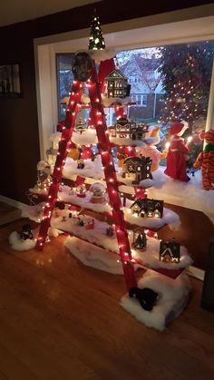 a christmas tree made out of snow and lights