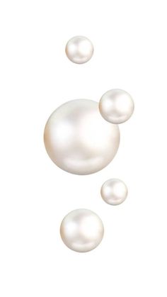 three white pearls floating in the air