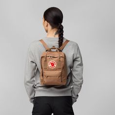 Behold the Fjällräven Kånken Mini: a tiny titan of style and convenience that's ready to revolutionize your everyday carry game! Picture this mini marvel as your trusty sidekick, always by your side as you navigate the bustling city streets or wander through tranquil nature trails. With its charming design and extremely practical features, the Kånken Mini is more than just a bag – it's a statement piece that adds a touch of whimsy to your daily adventures.Step into the world of fun and functionality with the Fjällräven Kånken Mini – the little bag with big personality! From its compact size to its durable construction, every aspect of this mini masterpiece is designed to make your life easier and your style brighter. Whether you're running errands around town or exploring the great outdoor Fjallraven Kanken Backpack Fog Pink, Whats In My Fjallraven Backpack, Fjallraven Kanken No 2 Laptop 15, Converse Backpack Inside, Fjallraven Kanken Mini, Trekking Jacket, Hunting Backpacks, Popular Backpacks, Kanken Mini