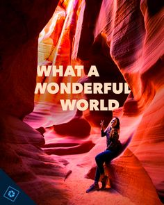 a woman sitting in the middle of a canyon with text that reads, what a wonderful world