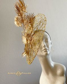 Aimee Fuller Kentucky Derby Fascinator Structured, chic crisscross woven material with layers of golden palm leaves / fronds. A wonderful tropical treat! Easy-to-wear headband fascinator makes a statement and can be worn to a myriad of events: Easter, Bridal, Derby-Wear, Del Mar Races, Hat Contests, Church, Gala, Kentucky Derby, Melbourne Cup, High Tea, Weddings, Cocktail Parties, Weddings, and More.  Some customizations available; please message with your requests to see if we can meet your needs. *FREE SHIPPING  For more STATEMENT JEWELRY and HANDMADE HATS go to www.aimeesfuller.com Aimee Fuller has been a trusted online seller since 1999, and is excited to bring her creations back to Etsy.  Though often copied by hobbyists and even high-end department stores, discriminating fashionistas Luxury Gold Fascinator For Spring, Luxury Gold Fascinator For Formal Occasions, Luxury Gold Fascinator For Parties, Luxury Gold Summer Fascinator, Luxury Gold Headpiece For Races, Luxury Gold Spring Fascinator, Luxury Gold Fascinator With Structured Crown, Handmade Gold Hat For Kentucky Derby, Fitted Gold Summer Hat