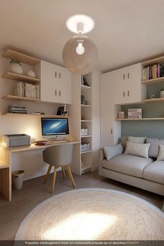 a living room with a couch, computer desk and bookshelf