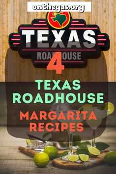 the texas roadhouse sign with margaritas and limes on it in front of a wooden