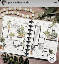 an open planner with plants on it