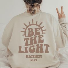 Be the Light Sweatshirt Gift for Christians Mathew 5:14 - Etsy Things To Put On Sweatshirts, Biblical Sweatshirts, Cute Christian Sweatshirt Designs, Cute Sweatshirts Christian, Be The Light Shirt Design, Be The Light Sweatshirt, Christian Sweatshirts Hoodie, Gift Ideas For Christians, Cute Cricut Sweatshirt Ideas