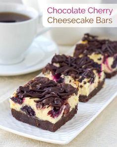 chocolate cherry cheesecake bars on a white plate