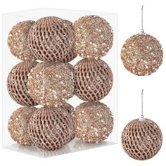 a set of six christmas balls hanging from the side of a clear box with gold sequins on it