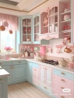 a pink and blue kitchen with lots of cupboards