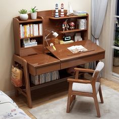 a wooden desk with a chair next to it and bookshelves on the wall