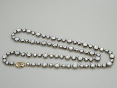 This Georgian Victorian Diamond or Moissanite Riviere Button Back Collet Tennis Necklace is a piece designed for daily admiration. Echoing the grace of historic riviere diamond necklaces favored by royalty, it features lab grown diamonds or moissanites set within Georgian cut-down collet settings. The rounded gold dome of the setting ensures that this necklace not only radiates elegance but also graces your skin with comfort, inviting you to embrace its beauty day by day. Handcrafted in blackene Beauty Day, Georgian Jewelry, Diamond Necklaces, Brooch Jewelry, Day By Day, Tennis Necklace, The Grace, Ring Bracelet, Lab Grown