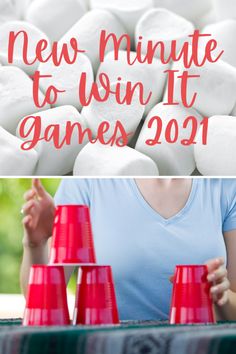 a woman is sitting at a table with red cups and white marshmallows