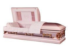 a pink casket with a white blanket on top