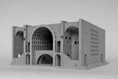 an architectural model of a building made out of concrete with arched doorways and arches