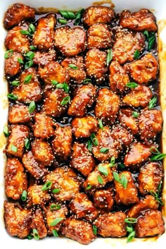 an overhead view of chicken wings with sauce in a casserole dish