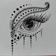 a drawing of an eye with dots and lines on the iris's eyes, which are drawn in black ink