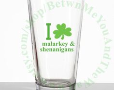 a shot glass with the words i shamrock and markey & sheannigans on it