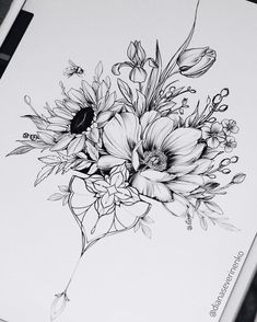 a black and white drawing of flowers in a vase