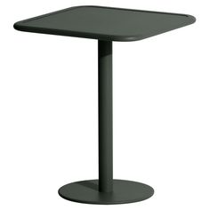 a square table with a metal base on an isolated white background for use as a side table