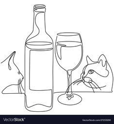 a bottle of wine and a glass with a cat sitting next to it on a table