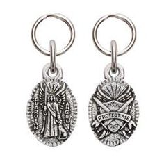 two silver key chains with an image of the virgin mary and jesus on one side