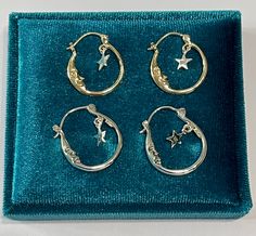 Stylish Celestial Half Moon and Star Hoop Earrings ~ Three Choices to choose from:  Option 1- 10k Double Sided Yellow gold Moon with sterling silver star Earrings: 1 x 7/8" or 21.5 mm x 19.5 mm -Weight (both earrings): 2.80 grams Option 2- Double Sided Sterling Silver Earrings: 1 x 7/8" or 21.5 mm x 19.5 mm-Weight (both earrings): 5.27 grams Option 3- Single Sided Sterling Silver Earrings: 1 x 7/8" or 21.5 mm x 19.5 mm-Weight (both earrings): 2.92 grams ERA- 2023 METAL / MATERIAL - 10k Yellow Gold, Sterling Silver MARKINGS / HISTORY - Earrings are marked 10k and or 925 CONDITION - New Moon Hoop Earrings, 70s Hoop Earrings, Whimsigoth Earrings, Silver Moon Earrings, Sterling Silver Star Earrings, Star Hoop Earrings, Silver Star Earrings, Celestial Earrings, Moon And Star Earrings