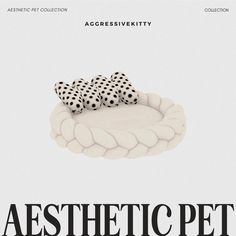 an ad for aesthetic pet, with two black and white polka dot pillows