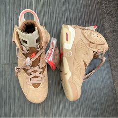 Jordan 6 Retro Travis Scott British Khaki Size: 7 Mens/8.5 Womens Brand New W/ Tags! Comes With Stockx Authenticity Such A Cool Style! The Bottom Soles Are Glow In The Dark. Need Gone Asap. Just Been Sitting In My Closet, Ain’t My Style. Shoot Me Reasonable Offers! The Upper Of The Air Jordan 6 Retro Travis Scott British Khaki Is Made Of British Khaki Suede. From There, Hits Of Bright Crimson Appear On The Heel And Tongue Embroidered Logos. The Upper Also Has Two Cargo Pockets: One With A Snap E Jordan Travis Scott, Travis Scott Shoes, Men's Fashion Sneakers, Nike Shoes Women Fashion, Jordan Retro 6, Air Jordan 6 Retro, British Khaki, Jordan 6 Retro, Dope Fits