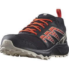 a black and orange shoe with red laces on the side, in front of a white background