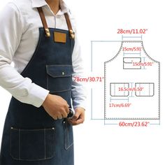 a man wearing an apron and holding a camera in one hand, with measurements for the overalls