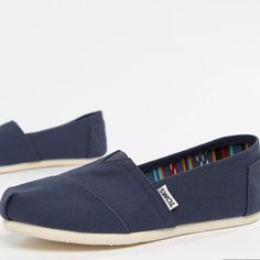 Toms Classic Canvas Flat Shoes In Navy Canvas Upper Elasticated Insert Cushioned Comfort Insole Arch Insert For Added Support Woven One-Piece Midsole With Every Pair Of Shoes Purchased, Toms Give A Pair Of New Shoes To A Child. One For One. Look After Me Just Give Them A Quick Wipe With A Soft Cloth To Clean For All-Day-Everyday Ease Canvas Upper It's Tougher Than It Looks Lining: 50% Real Leather, 50% Textile, Sole: 50% Other Materials, 50% Textile, Upper: 100% Textile. Toms Espadrilles, Floral Espadrilles, Toms Flats, Lace Up Ballet Flats, White Espadrilles, Blue Espadrilles, Toms Classic, Striped Shoes, Canvas Slip On Shoes