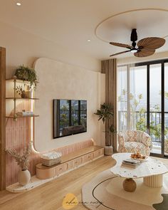 a living room filled with furniture and a flat screen tv mounted on a wall next to a window