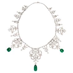 Rare Himalayan Mountain Emerald and Diamond convertible Tiara/Necklace A very beautiful and unique tiara that also converts into a necklace. It features 3 stunning GRS-certified natural emerald beads weighing a total of 27.05 carats, embellished with numerous white round brilliant diamonds weighing 12.27 carats. The emeralds, certified by GRS Lab as hailing from a specific part of the exotic Himalayan Mountains that traverse Afghanistan and Pakistan, are natural with only minor oil-based clarity Swedish Royal Tiaras, Elegant Formal Emerald Necklace With Intricate Design, Convertible Tiara, Unique Tiara, Tiara Necklace, Himalayan Mountains, Necklace Emerald, Pearl Tiara, Royal Tiaras