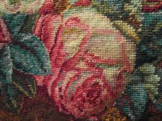 a close up view of a floral tapestry