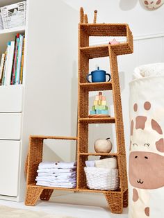 a shelf that has some items on it in the corner next to a bookcase