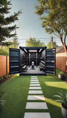 an open shipping container sitting on top of a lush green field