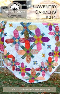 an image of a quilt on a fence with the words, country garden 3 in front of