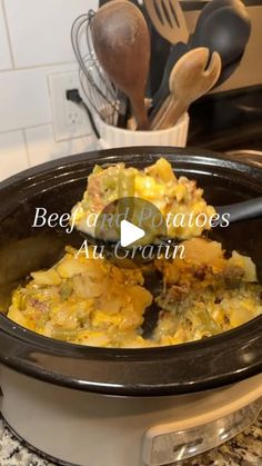 a crock pot filled with food sitting on top of a counter