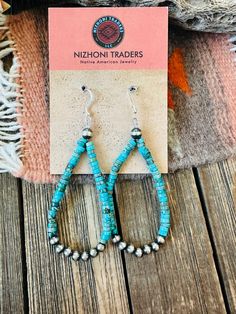 New without tags    ETHNIC & REGIONAL STYLE : Native American      JEWELRY TYPE : Earrings      TYPE : Beads      FEATURED REFINEMENTS : Navajo Earrings      MATERIAL : Stone      METAL : Sterling Silver      TRIBAL AFFILIATION : Navajo      MAIN STONE : Turquoise  Navajo Turquoise and Sterling Silver Navajo Pearl beaded dangle hoop earrings. Such a great pair for any collection! These beauties measure 3 1/2 inches long and 1 1/4 inches wide. Stones are natural and may vary.  Thank you for checking out our items. Please contact us if you have any questions. 9/5/23 bin 2 3/11/24 inv mr Stretch Beaded Bracelets Diy, Navajo Earrings, Native American Earrings, Travel Jewelry Box, Bridesmaid Gifts Jewelry, Mixed Metal Jewelry, Dangle Hoop Earrings, Bracelets Diy, Navajo Turquoise