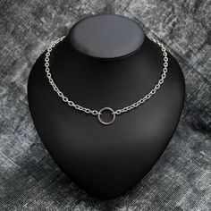 I made this O-Ring necklace with stainless steel cable chain and a ~3/4" (20mm) O ring. All of my jewelry is handmade by me, not imported. I use thick stainless hardware that is not delicate or fragile. Looks great layering with other chains. Chain links are 7mm x 5mm, 1.5mm thick. ★𝙎𝙄𝙕𝙀 Measured from end to end. Choose your own size and please measure to be sure you'll like the fit (you can use a piece of string around your neck). All measurements/sizing are approximate of the length of the chain when cut to the closest link. When in doubt, size up.  ★𝙈𝘼𝙏𝙀𝙍𝙄𝘼𝙇𝙎 * 100% Stainless Steel * Stainless steel is hypoallergenic, resistant to tarnishing, and waterproof! Great option for people with sensitive skin. ★𝘾𝘼𝙍𝙀 🚿✔️ Shower Safe ✨ All jewelry will look better for longer if Goth Necklaces, Alt Jewelry, Necklace Grunge, Industrial Necklace, Punk Choker, Punk Necklace, Jewelry Goth, Goth Necklace, Grunge Jewelry