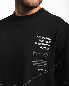 In life, you only have mastery over your thoughts and actions. Through disciplined thought and disciplined action, you begin to foster growth by aligning a focused mindset with purposeful execution. This stretch cotton oversized tee is constructed to provide you with optimal airflow as the rounds build up. Featuring Disciplined Thought, Disciplined Action text and icons, complemented with the golden ratio construction of the Strike Logo, this shirt serves as a reminder to the process we must fol Quotes Shirt Design, Text T Shirt Designs, Cool Tshirt Designs Creative, Tee Shirt Designs Graphics, Tshirt Text Design, T Shirt Ideas Design, Tshirts Design Ideas, Make Up Branding, Black Tshirt Design