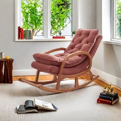 a rocking chair in the corner of a room next to a book shelf and window