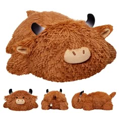 the stuffed animal is brown with black horns