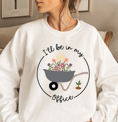 "Funny Gardening Shirt , Hoodie , Gardner Gift , I'll Be in My Office , Garden Pun Gift ,Gardening Gift , Funny Gardener Gift Thank you so much for taking the time to browse my shop. Please feel free to reach out if you have any questions before or after purchasing. 💖 All of our items are just for you. We design and cut each graphic out with a soft touch, use matte vinyl and a heat press. The result will last for many washes. ✨please read the description. This Sweatshirt is not oversized, you n Greenhouse Shirt Ideas, Gifts For Gardeners, Gardner Gifts, Casual Spring T-shirt For Gardening, Garden Puns, Gardening Shirts Funny, Cotton T-shirt With Graphic Print For Gardening, Gardening Humor, Garden Lover Gifts