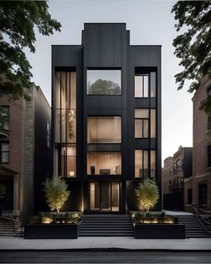 a black building with lots of windows and stairs