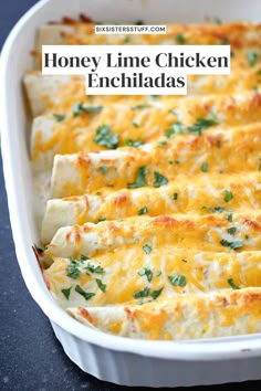 a casserole dish filled with chicken enchiladas