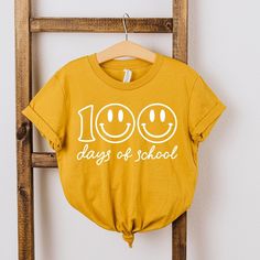 Looking for a cute tee for your kids? We have the perfect 100 Days Of School Smiley Face graphic tee addition to their closet! Also available in toddler tees. Kids Fourth Of July, Smiley Face Graphic, Smiley Face Shirt, Face Graphic, 100 Days Of School, Toddler Tees, 100 Days, Smiley Face, Smiley