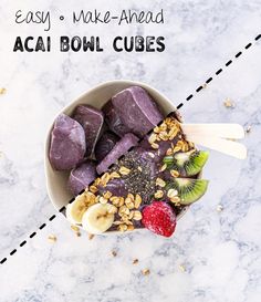 a bowl filled with fruit and nuts on top of a table