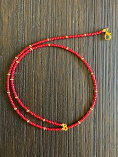 This necklace is made with red Toho seed beads and gold-plated brass corrugated rondelle beads. Red Beaded Necklaces, Thread Necklace, Beads Mala, Perfume Store, Red Thread, Necklace Choker, Red Bead, Bead Crochet, Beaded Necklaces